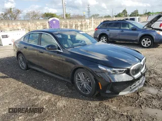 2024 BMW 5 Series 530i with VIN WBA43FJ03RCP86217, listed as a Copart auction lot 46817445 with 27,562 mi miles and Salvage Title. Bid and sale history available at carsss.com. Image 4.