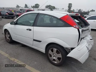 2003 Ford Focus ZX3 with VIN 3FAFP31Z23R147547, listed as a IAAI auction lot 42426117 with 129,860 mi miles and . Bid and sale history available at DreamBid. Image 3.