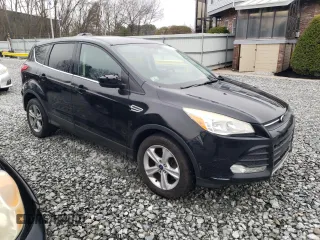 2014 Ford Escape SE with VIN 1FMCU9G94EUA88136, listed as a Copart auction lot 53379805 with 144,286 mi miles and Clean Title. Bid and sale history available at carsss.com. Image 4.