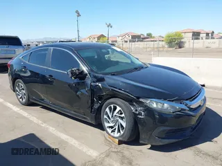 2018 Honda Civic Sedan EX with VIN 19XFC2F74JE021802, listed as a IAAI auction lot 42031745 with 102,986 mi miles. Bid and sale history available at carsss.com. Image 1.