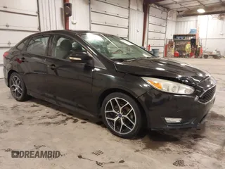 2015 Ford Focus SE with VIN 1FADP3F24FL255450, listed as a IAAI auction lot 41673301 with 103,650 mi miles. Bid and sale history available at carsss.com. Image 1.