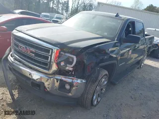 2015 GMC Sierra 1500 SLE with VIN 3GTU2UEC9FG338474, listed as a IAAI auction lot 41899379 with 140,859 mi miles. Bid and sale history available at carsss.com. Image 2.