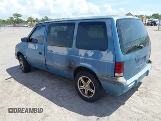 1994 Dodge Caravan z VIN 2B4GH25K4RR517492, wystawiony jako IAAI lot #41940051 z przebiegiem 241 574 mil mil oraz . Historia ofert i sprzedaży dostępna na DreamBid. Obrazek 3.