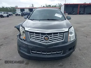 2015 Cadillac SRX with VIN 3GYFNAE30FS569009, listed as a IAAI auction lot 41718522 with 104,448 mi miles and . Bid and sale history available at DreamBid. Image 12.