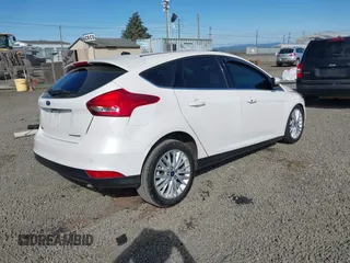 2017 Ford Focus Titanium with VIN 1FADP3N24HL308751, listed as a IAAI auction lot 42207247 with 109,736 mi miles and . Bid and sale history available at DreamBid. Image 4.