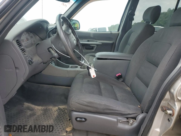 2002 Ford Explorer Sport Trac Value с VIN 1FMZU67E42UD24317, выставлен на аукционе Copart как лот 62999495 с пробегом 179 571 миль миль и Списание • Salvage title. История ставок и продаж доступна на DreamBid. Изображение 7.