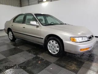 1997 Honda Accord LX with VIN JHMCD5630VC015585, listed as a Copart auction lot 52166155 with 121,820 mi miles and Salvage Title. Bid and sale history available at carsss.com. Image 4.