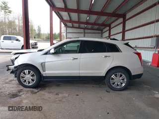 2015 Cadillac SRX Luxury Collection with VIN 3GYFNEE30FS567431, listed as a IAAI auction lot 42118084 with 140,778 mi miles. Bid and sale history available at carsss.com. Image 14.