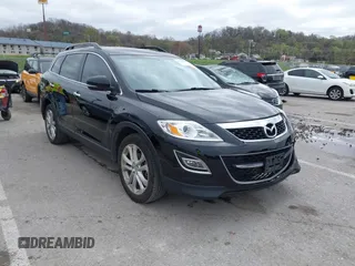2011 Mazda CX-9 Grand Touring with VIN JM3TB2DAXB0300466, listed as a IAAI auction lot 41921411 with 196,257 mi miles. Bid and sale history available at carsss.com. Image 1.