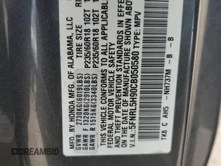 2012 Honda Odyssey Touring with VIN 5FNRL5H90CB050580, listed as a Copart auction lot 58502925 with 226,929 mi miles and Salvage title. Bid and sale history available at DreamBid. Image 13.