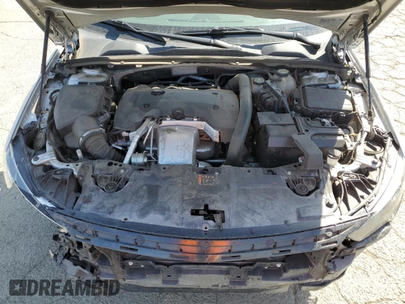 2018 Buick Regal Essence with VIN W04GP6SX9J1144630, listed as a Copart auction lot 53074585 with 96,077 mi miles and Salvage title. Bid and sale history available at DreamBid. Image 11.