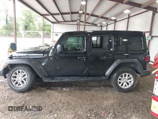 2023 Jeep Wrangler Willys with VIN 1C4HJXDG0PW617101, listed as a IAAI auction lot 42111687 with 56,415 mi miles and . Bid and sale history available at DreamBid. Image 15.