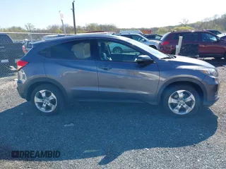 2016 Honda HR-V EX-L w/Navi with VIN 3CZRU6H70GM726023, listed as a IAAI auction lot 42049814 with 120,123 mi miles. Bid and sale history available at carsss.com. Image 13.