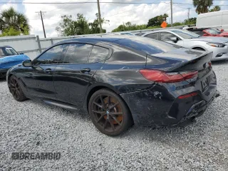 2020 BMW 8 Series M850i z VIN WBAGV8C06LBP48901, wystawiony jako Copart lot #57595725 z przebiegiem 88 332 mil mil oraz Tytuł czysty. Historia ofert i sprzedaży dostępna na DreamBid. Obrazek 2.