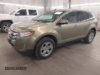 2013 Ford Edge SEL with VIN 2FMDK4JC0DBE09448, listed as a IAAI auction lot 41851293 with 166,501 mi miles. Bid and sale history available at carsss.com. Image 2.