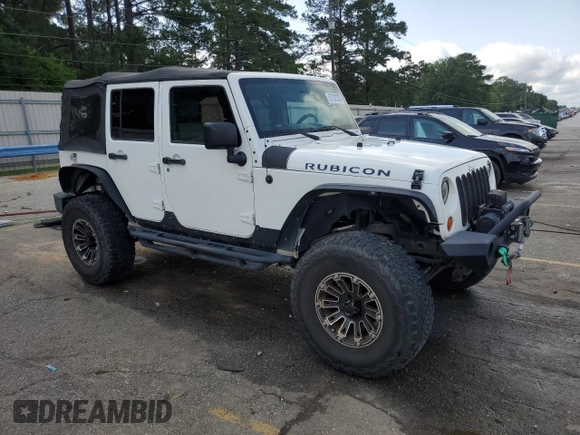 2010 Jeep Wrangler Unlimited Rubicon with VIN 1J4BA6H10AL176014, listed as a Copart auction lot 57092255 with 138,253 mi miles and Salvage title. Bid and sale history available at DreamBid. Image 4.
