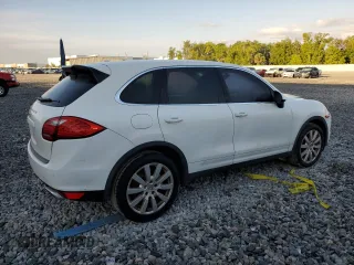 2013 Porsche Cayenne S с VIN WP1AB2A28DLA85229, выставлен на аукционе Copart как лот 50935415 с пробегом 215 629 миль миль и Списание • Salvage title. История ставок и продаж доступна на DreamBid. Изображение 3.