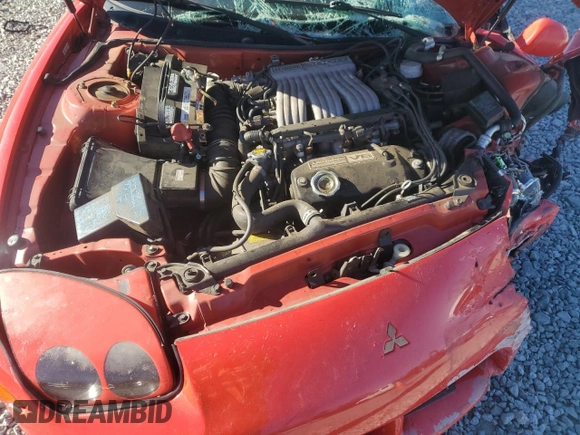 1998 Mitsubishi 3000GT z VIN JA3AM44H1WY000582, wystawiony jako Copart lot #83478284 z przebiegiem 169 140 mil mil oraz Szkoda całkowita • Salvage title. Historia ofert i sprzedaży dostępna na DreamBid. Obrazek 13.