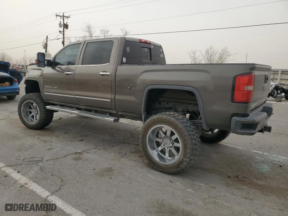 2015 GMC Sierra 2500HD available WiFi Denali with VIN 1GT120E86FF625876, listed as a Copart auction lot 45034795 with 134,185 mi miles and Salvage Title. Bid and sale history available at carsss.com. Image 2.