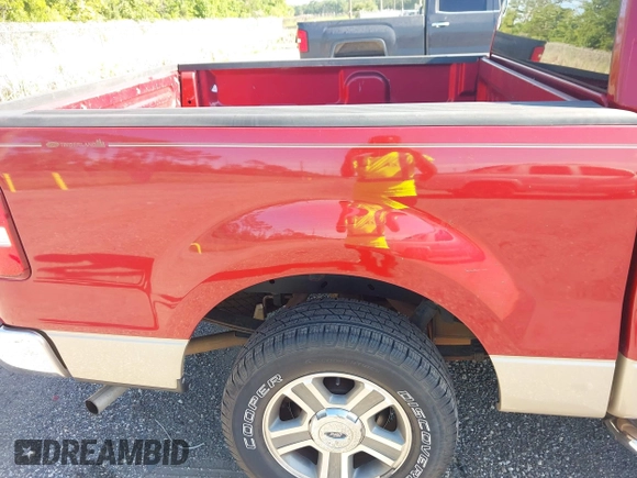 2007 Ford F-150 XLT with VIN 1FTRW12W57KD02864, listed as a IAAI auction lot 42771196 with 1,146,079 mi miles and . Bid and sale history available at DreamBid. Image 12.