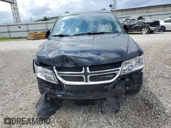 2017 Dodge Journey SXT with VIN 3C4PDCBG5HT576180, listed as a Copart auction lot 65262685 with 103,565 mi miles and Salvage title. Bid and sale history available at DreamBid. Image 5.