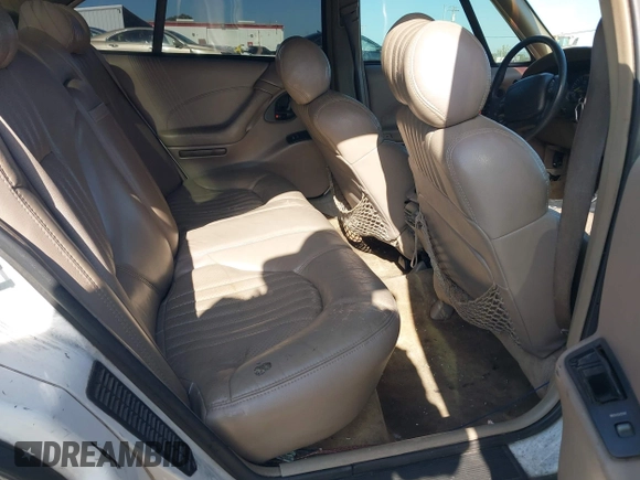 1999 Pontiac Bonneville SE z VIN 1G2HX52KXXH254051, wystawiony jako IAAI lot #41990245 z przebiegiem 213 000 mil mil oraz . Historia ofert i sprzedaży dostępna na DreamBid. Obrazek 8.