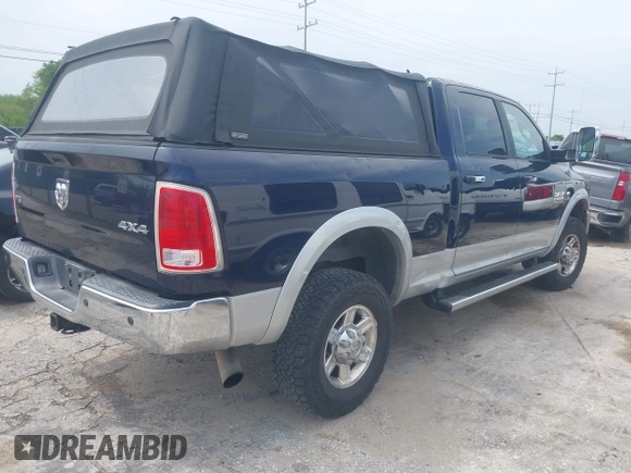 2013 Ram 2500 Laramie with VIN 3C6UR5FL1DG526345, listed as a IAAI auction lot 42328430 with 121,155 mi miles and . Bid and sale history available at DreamBid. Image 4.