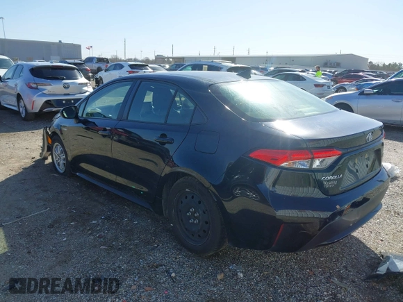 2021 Toyota Corolla Hybrid LE with VIN JTDEAMDE8MJ034218, listed as a IAAI auction lot 41692711 with 65,651 mi miles. Bid and sale history available at carsss.com. Image 3.