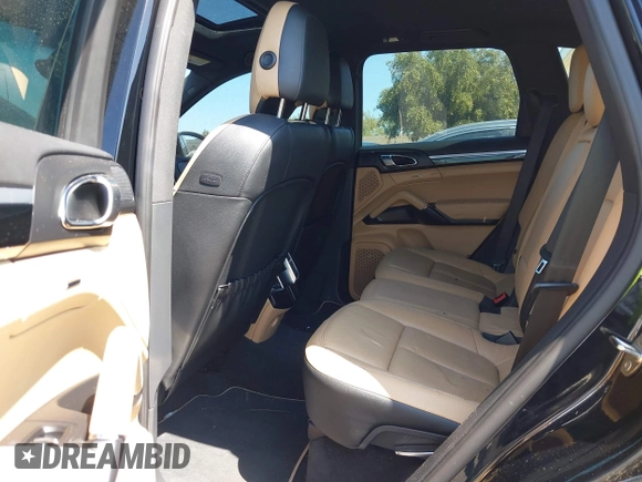 2014 Porsche Cayenne with VIN WP1AA2A23ELA09728, listed as a IAAI auction lot 42289887 with 153,533 mi miles and . Bid and sale history available at DreamBid. Image 8.