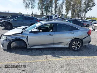 2016 Honda Civic Sedan EX with VIN 2HGFC2F74GH563268, listed as a IAAI auction lot 41805038 with 125,577 mi miles. Bid and sale history available at carsss.com. Image 14.
