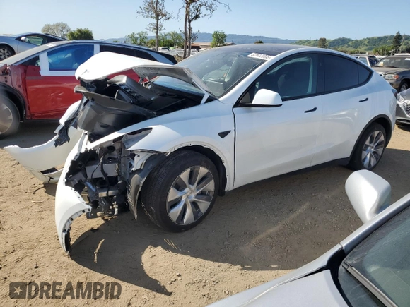 2024 Tesla Model Y Long Range with VIN 7SAYGDEE0RF081948, listed as a Copart auction lot 52612805 with 12,099 mi miles and Salvage Title. Bid and sale history available at DreamBid. Image 1.