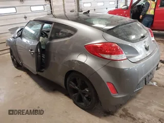 2016 Hyundai Veloster with VIN KMHTC6AD8GU267426, listed as a IAAI auction lot 41349385 with 114,245 mi miles. Bid and sale history available at carsss.com. Image 3.