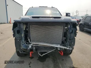2021 GMC Sierra 3500HD AT4 z VIN 1GT49VEY9MF269605, wystawiony jako Copart lot #66775054 z przebiegiem 13 890 mil mil oraz Szkody całkowita. Historia ofert i sprzedaży dostępna na DreamBid. Obrazek 5.