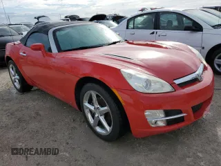 2009 Saturn Sky z VIN 1G8MN35B79Y103875, wystawiony jako Copart lot #74669844 z przebiegiem Nie podano mil oraz Szkody całkowita. Historia ofert i sprzedaży dostępna na DreamBid. Obrazek 4.