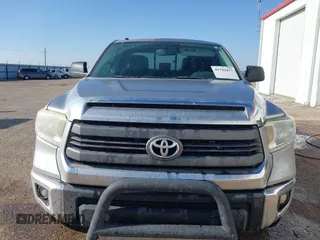 2014 Toyota Tundra SR with VIN 5TFRM5F13EX078411, listed as a IAAI auction lot 42702477 with 123,336 mi miles and . Bid and sale history available at DreamBid. Image 6.