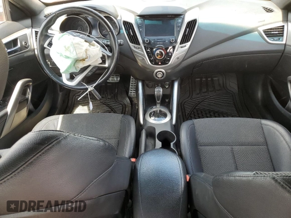 2016 Hyundai Veloster z VIN KMHTC6ADXGU270540, wystawiony jako Copart lot #54575165 z przebiegiem 122 606 mil mil oraz Szkody całkowita. Historia ofert i sprzedaży dostępna na DreamBid. Obrazek 8.