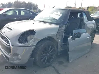 2017 MINI Convertible Cooper S z VIN WMWWG9C36H3C81439, wystawiony jako IAAI lot #41480915 z przebiegiem 64 104 mil mil oraz . Historia ofert i sprzedaży dostępna na DreamBid. Obrazek 6.