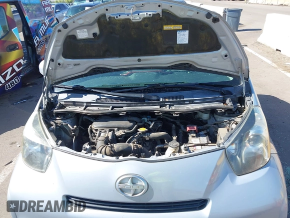2014 Scion iQ with VIN JTNJJXB02EJ027026, listed as a IAAI auction lot 42619439 with 103,261 mi miles and . Bid and sale history available at DreamBid. Image 10.