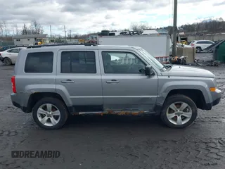 2014 Jeep Patriot Latitude with VIN 1C4NJRFB6ED778433, listed as a IAAI auction lot 41211522 with 127,506 mi miles. Bid and sale history available at carsss.com. Image 13.