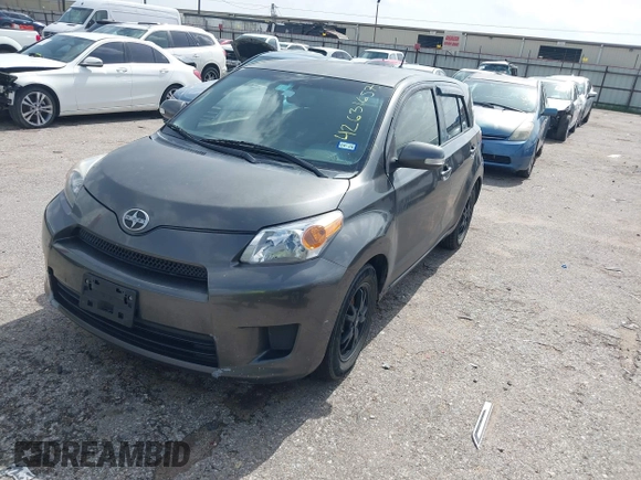 2010 Scion xD with VIN JTKKU4B44A1000334, listed as a IAAI auction lot 42631657 with 194,449 mi miles and . Bid and sale history available at DreamBid. Image 2.