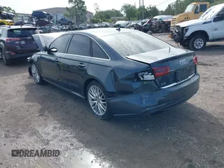 2016 Audi A6 Premium Plus with VIN WAUFGAFC3GN180467, listed as a IAAI auction lot 42429785 with 121,033 mi miles and . Bid and sale history available at DreamBid. Image 3.