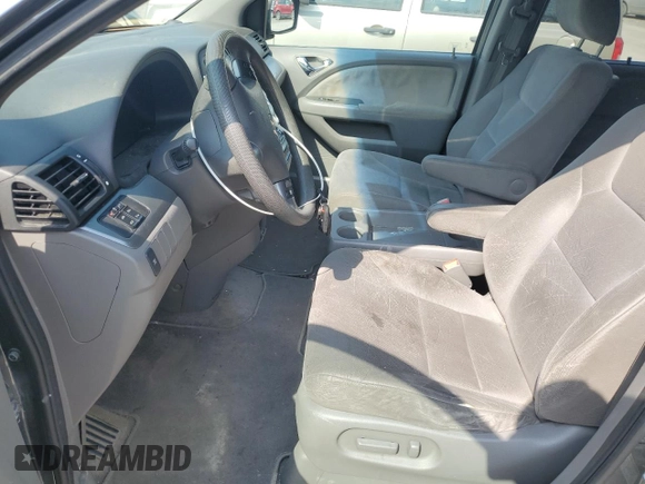 2010 Honda Odyssey EX with VIN 5FNRL3H48AB011905, listed as a Copart auction lot 54990195 with 236,506 mi miles and Clean Title. Bid and sale history available at DreamBid. Image 7.