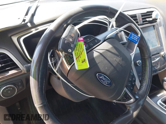 2015 Ford Fusion SE z VIN 3FA6P0H92FR247432, wystawiony jako IAAI lot #42044461 z przebiegiem 148 616 mil mil oraz . Historia ofert i sprzedaży dostępna na DreamBid. Obrazek 11.