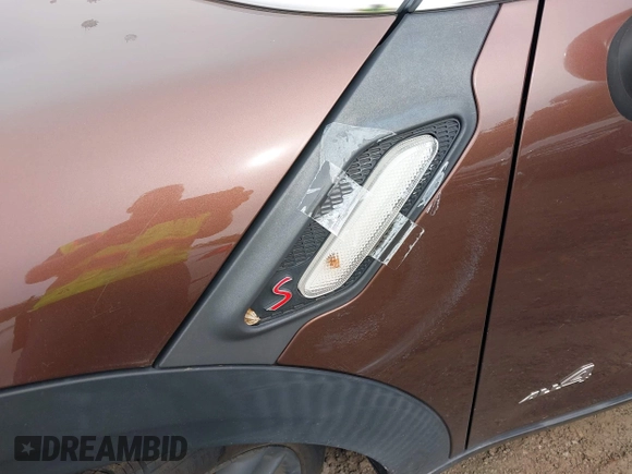 2014 MINI Countryman S with VIN WMWZC5C5XEWP38408, listed as a IAAI auction lot 42360746 with 136,266 mi miles and . Bid and sale history available at DreamBid. Image 6.
