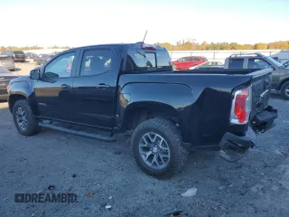 2021 GMC Canyon 4WD AT4 w/Cloth with VIN 1GTG6FEN5M1100096, listed as a Copart auction lot 77535584 with 25,152 mi miles and Salvage Title. Bid and sale history available at carsss.com. Image 2.