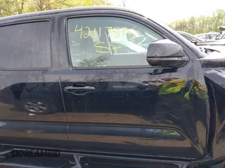 2022 Toyota Tacoma SR with VIN 3TYCZ5AN0NT074683, listed as a IAAI auction lot 42117875 with 51,112 mi miles and . Bid and sale history available at DreamBid. Image 13.
