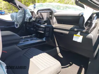 2023 Ford F-150 XL with VIN 1FTFW1E53PKD99214, listed as a IAAI auction lot 42211755 with 31 mi miles and . Bid and sale history available at DreamBid. Image 5.