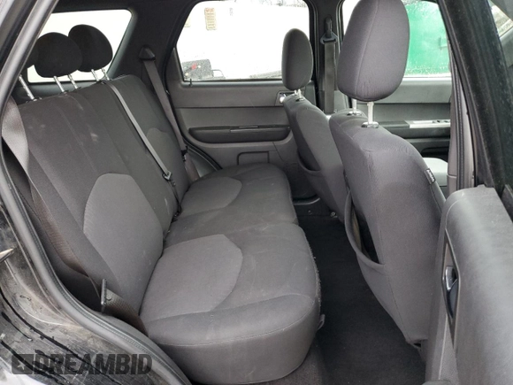 2008 Mercury Mariner z VIN 4M2CU81Z98KJ39101, wystawiony jako Copart lot #85359614 z przebiegiem 215 565 mil mil oraz Szkoda całkowita • Salvage title. Historia ofert i sprzedaży dostępna na DreamBid. Obrazek 11.