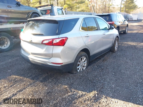2021 Chevrolet Equinox LT with VIN 3GNAXUEV6MS165648, listed as a IAAI auction lot 41554980 with 71,647 mi miles and . Bid and sale history available at DreamBid. Image 4.