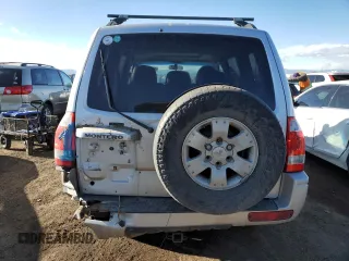 2003 Mitsubishi Montero LTD with VIN JA4NW51S23J039876, listed as a Copart auction lot 88539975 with 181,008 mi miles and Salvage Title. Bid and sale history available at carsss.com. Image 6.